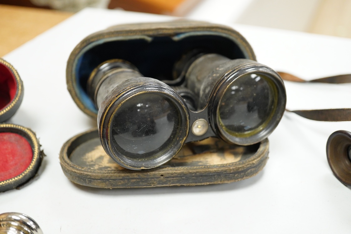 A Le Coultre desk timepiece, and four pairs of opera glasses